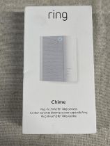 A boxed and sealed Ring plug in door chime (untested)