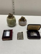 A selection of vintage lighters including Ronson