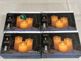 Four boxed LED remote control candle sets (untested/unchecked)