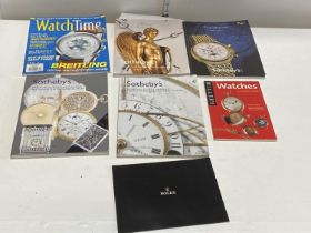 A selection of Christies catalogues for wrist watches and other magazines