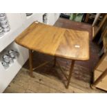 A vintage mid century Ercol extension piece, shipping unavailable