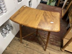 A vintage mid century Ercol extension piece, shipping unavailable
