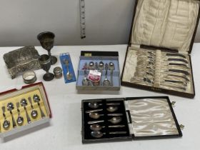 A selection of assorted collectables including cutlery and other items