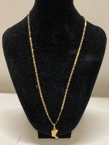 A 9ct gold chain and pendant 4.8g