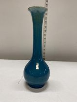 A Chinese circa 1850 bottle vase with blue glaze porcelain (repair to lip)