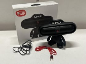 A boxed speaker Pills by Beats (untested)