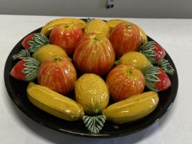 A Majolica style ceramic fruit bowl