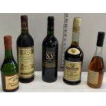 Five assorted bottles of sealed vintage alcohol including champagne cognac, brandy & wine etc