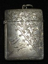 A hallmarked for Birmingham silver vesta case with monogram to cartouche, maker possibly Turner & Co