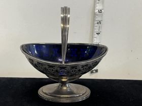 A hallmarked for London 1907 silver basket with blue liner, net weight of silver 180g