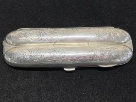 A hallmarked for Birmingham 1905 silver double cigar case with fine engraving and gilt interior,