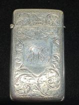 A hallmarked for Birmingham 1900 silver card case with monogram to cartouche, maker Joesph