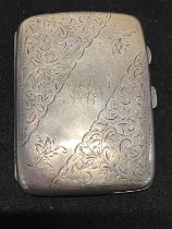 A hallmarked for Birmingham 1903 silver cigarette case with gilt interior with monogram to