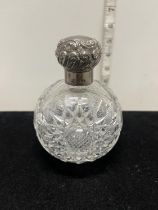 A hallmarked for London 1905 silver topped scent bottle by Mappin & Webb Brothers