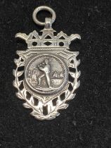 A hallmarked for Birmingham 1900 silver fob with cricketing interest, 11g