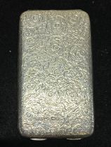 A hallmarked for Birmingham 1913 silver card case with fine engraving and monogram to cartouche,
