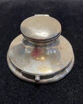 A hallmarked for Birmingham 1910 silver inkwell with glass liner and pull out stamp tray, maker