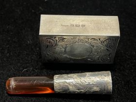 A hallmarked for Birmingham silver matchbox holder and silver cheroot holder with Amber mouthpiece