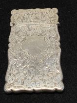 A hallmarked for Birmingham 1902 silver calling card case with blank cartouche possibly by William