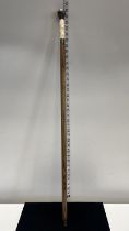 A hallmarked for London 1892 walking cane with dedication to top and bone handle, shipping