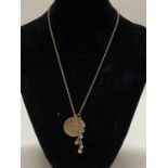 A 9ct gold chain and St Christopher pendant 6g