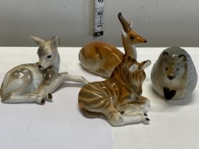 Four Russian Lomonosov figurines