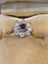 A 18ct gold Diamond and Sapphire ring size Q