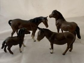 Four Beswick figurines, three horses and a donkey