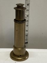 A lighthouse form trench art style heavy brass table lighter