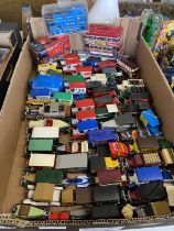 A box of assorted die-cast models