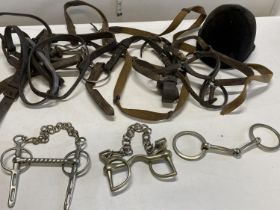 A job lot of assorted vintage equestrian tack