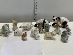 Fourteen Russian Lomonosov figurines