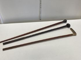 Three assorted antique walking sticks, one with horn handle, shipping unavailable