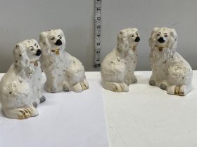 Two pairs of Royal Doulton flatback figurines