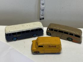 Three Dinky models (two buses and a van)