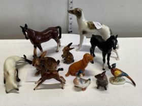 A selection of assorted ceramic figurines including Beswick a/f