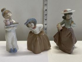Three Nao figurines