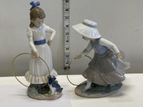 Two Nao figurines