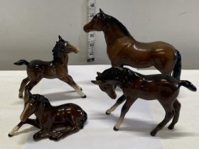 Four assorted Beswick horse figurines