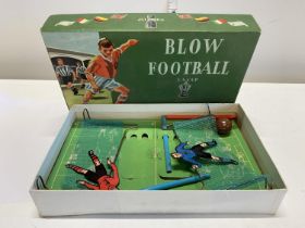 A vintage Marchant games blow football set