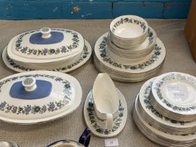 A Royal Doulton fine bone china dinner service entitled 'Esprit' 41 pieces, shipping unavailable