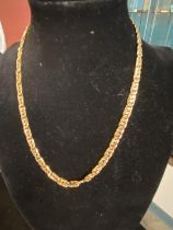 A 18ct gold necklace 23.37g. Chain length 44cm overall.