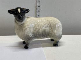 A ceramic ram figurine