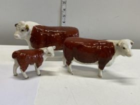 Three Beswick cattle figurines