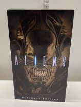 A boxed Neca Aliens ultimate edition figure