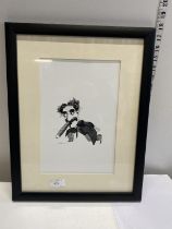 A framed ink picture by D Levine of Groucho Marxs, shipping unavailable