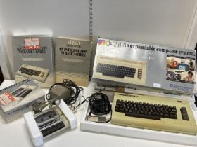 A boxed Commodore VIC20 computer system with instructions and accessories (untested)
