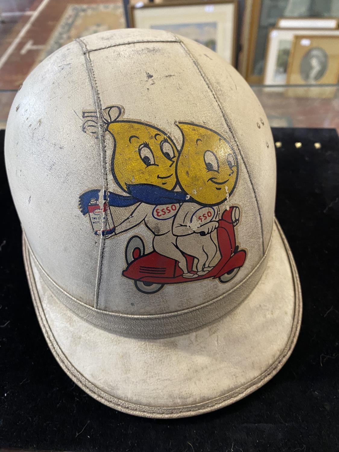 A vintage Everoak scooter helmet with Esso decal