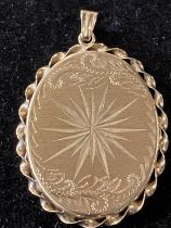 A 9ct gold locket 6.73g