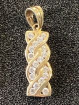 A 9ct gold pendant with white stones 1.83g